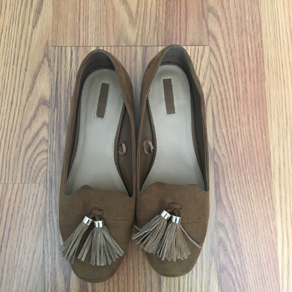 Suede tan loafers.